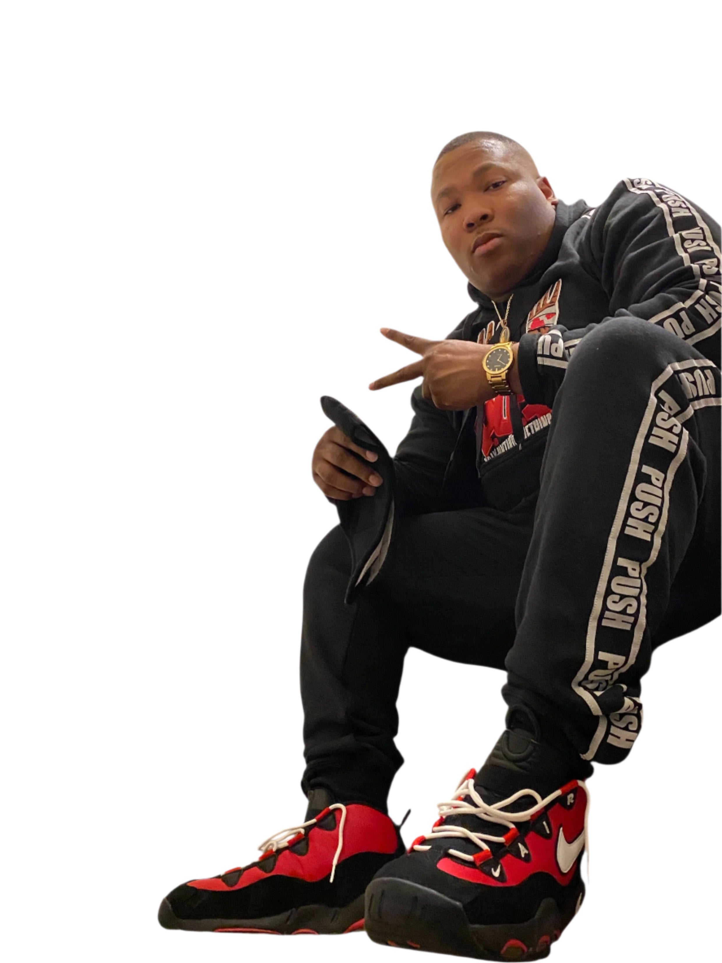 Black sweatsuit with Push logo on center chest. Strips coming down both sides of pants legs reading PUSH repeatedly with white outline to follow